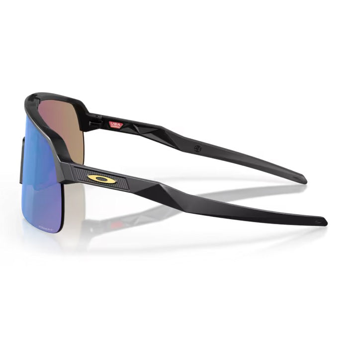 Oakley Sutro Lite Solbriller - Mat black-gold logo/Prizm Sapphire